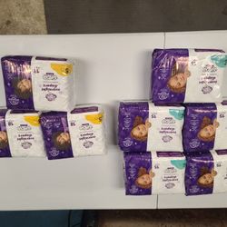 8  New Packs of Diapers - Sizes 5 & 6 - Cheap!