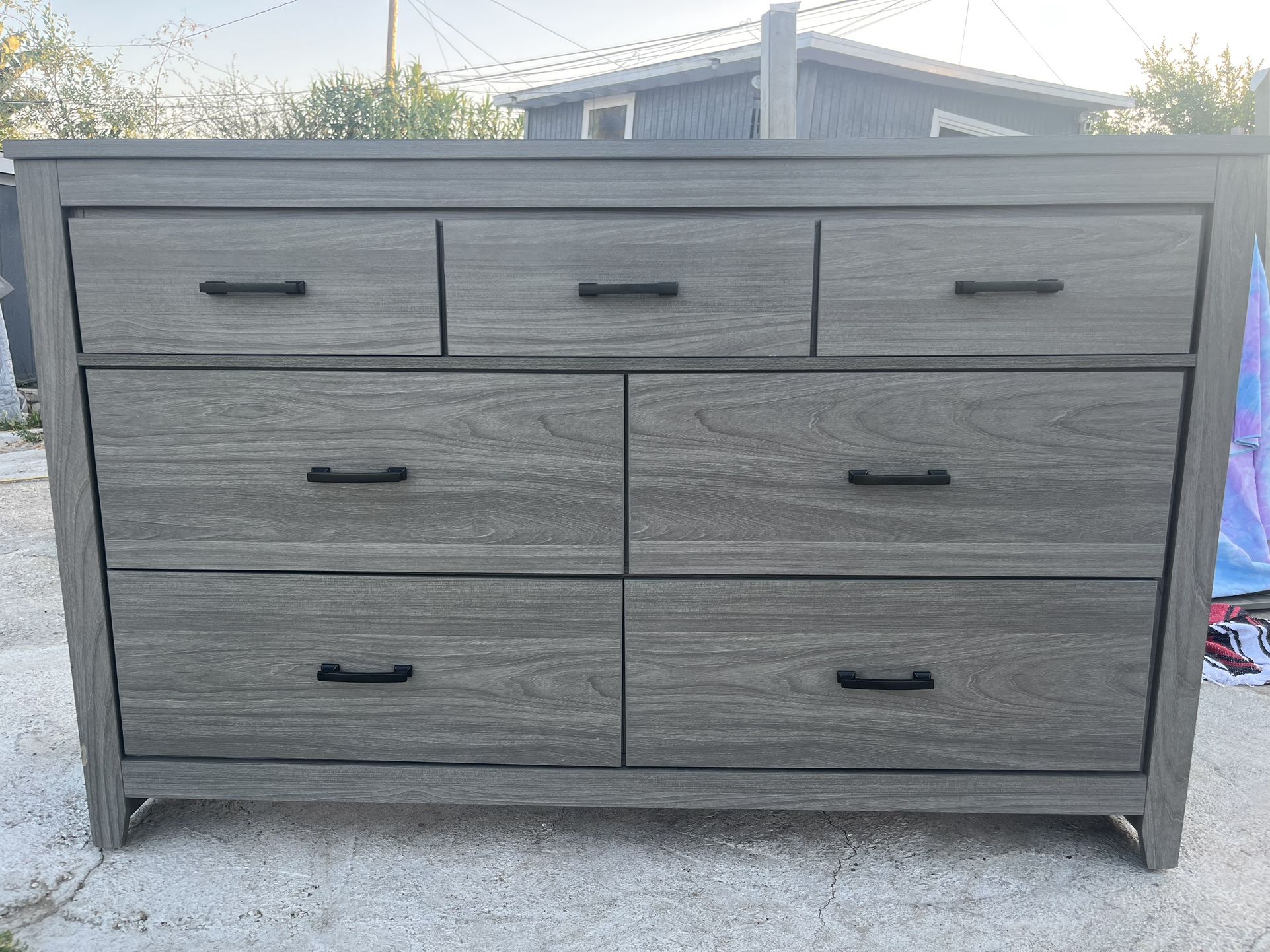 Bronyan Queen Panel Bed with Mirrored Dresser, and Nightstand