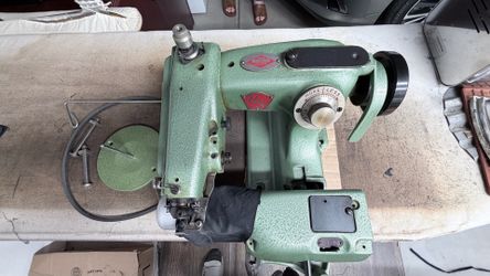 Blind stitch hemming machine
