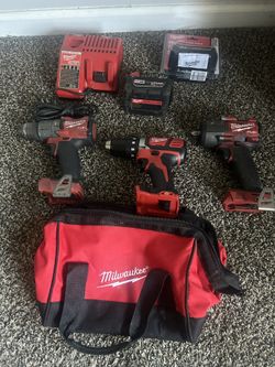 MILWAUKEE TOOLS , BATTERIES AND CHARGER