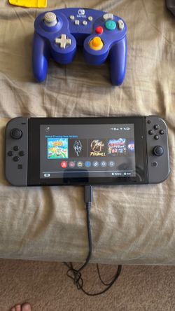 Nintendo switch first gen + wireless controller & games