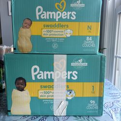 Swaddlers Diapers newborn and Size 1 
