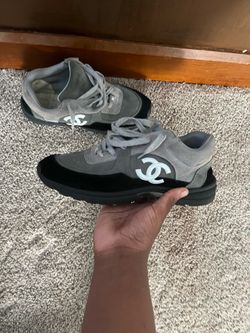 Black and gray Chanel runners
