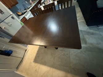 Real wood bar top table with extender.