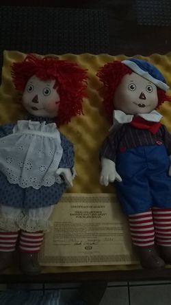 Porcelain Raggedy Ann & Andy doll with certificate of quality