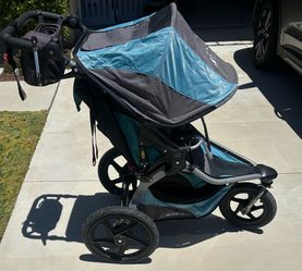 Bob stroller with infant car seat adapter and tire pump