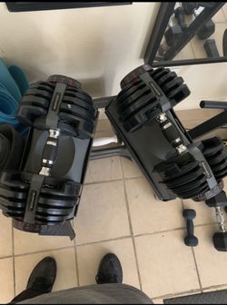 Bow flex ADJUSTABLE DUMBBELLS 5lbs.- 55lbs.