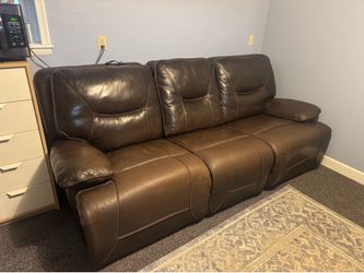 Reclining leather sofa
