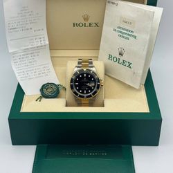1994 Rolex Submariner Date 40mm black dial 18k yellow gold two tone stainless steel oyster 16613 black bezel watch box tag papers
