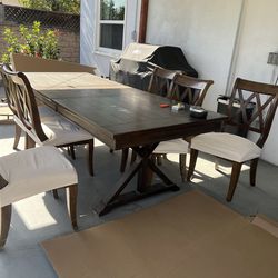Wooden table with 6 chairs