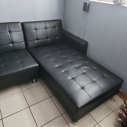 two-piece living room set in black faux leather,