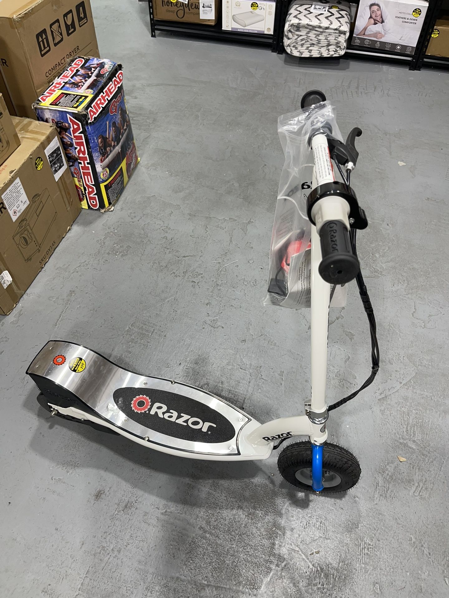 Razor E300 Electric Scooter for Kids Ages 13+ - 9" Pneumatic Tires, Up to 15 mph and 40 min of Ride Time, For Riders up to 220 lbs