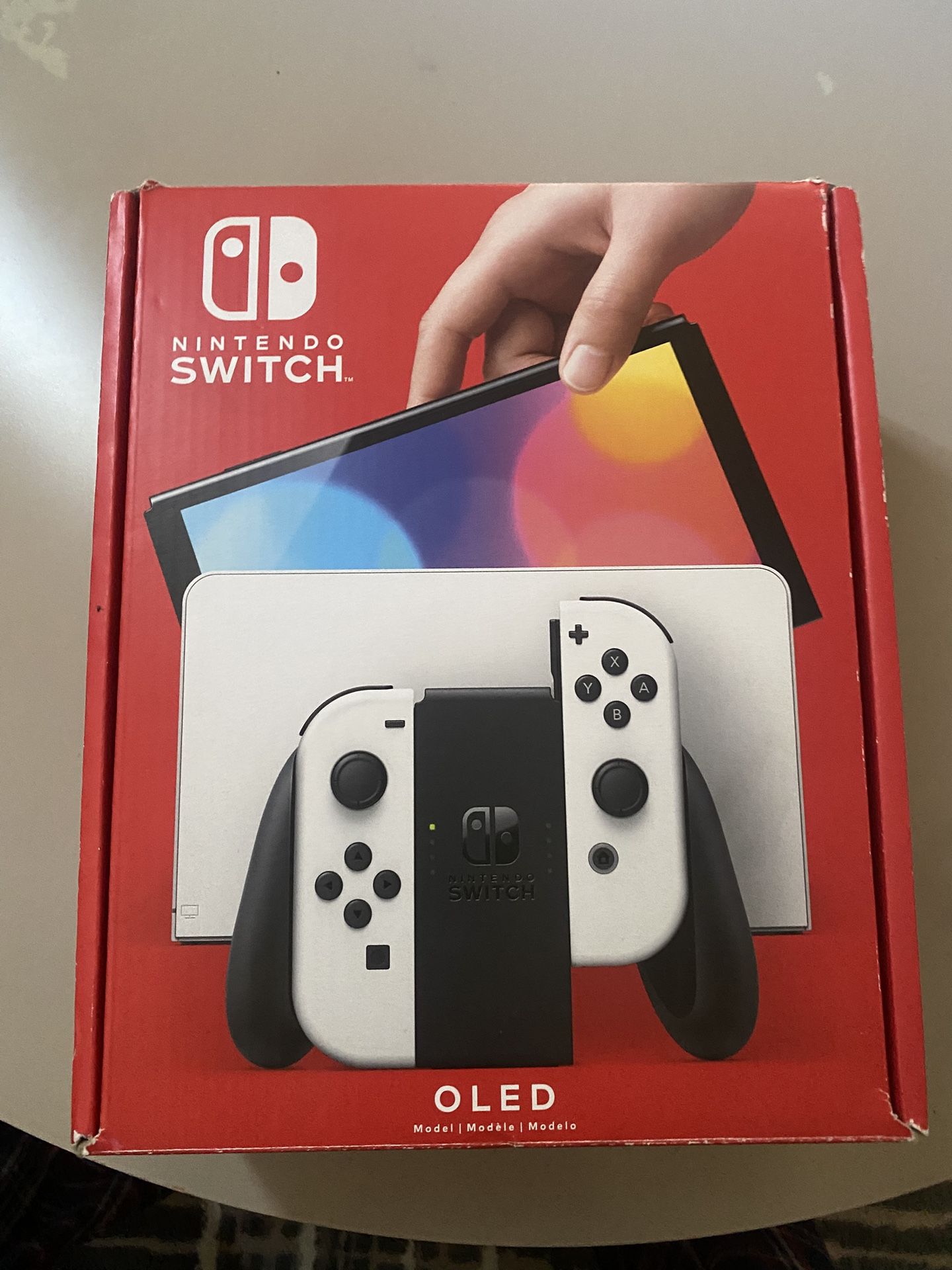 nintendo seitch oled NEW IN BOX comes with games