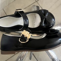 Black leather ballet flats