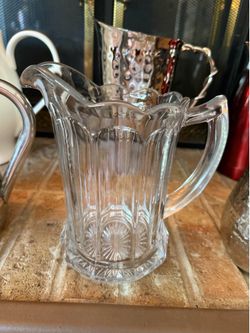 vintage Imperial Glass Colonial style pitcher featuring a scalloped rim and a pressed glass design