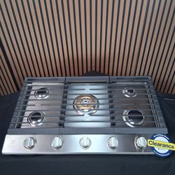 Electrolux 36" Gas Stovetop with 5 Sealed Burners, Continuous Cast Iron Grates, Power Burner (ECCG3668AS-D-269.)