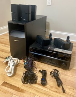 The Bose Acoustimass 16 is a discontinued 6.1-channel home theater speaker system with Yamaha Receiver