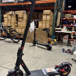 Front and rear shock-absorbing electric scooters
