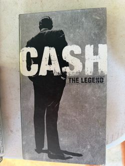 Johnny cash collection book with 3 cds in it and another cd gospel