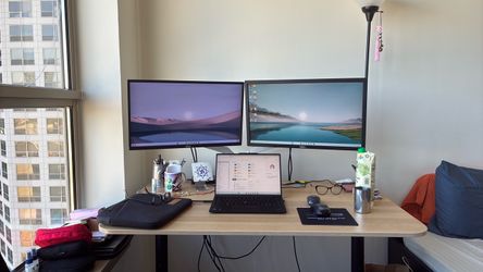 Two screens and the table stand to attach
