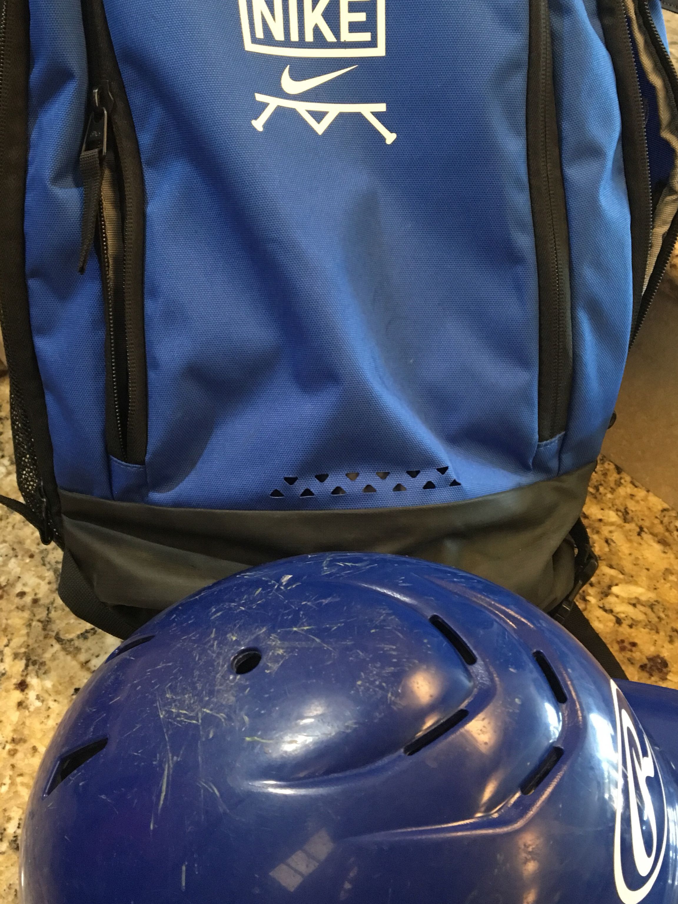 Lot boys baseball helmet and Nike backpack $30