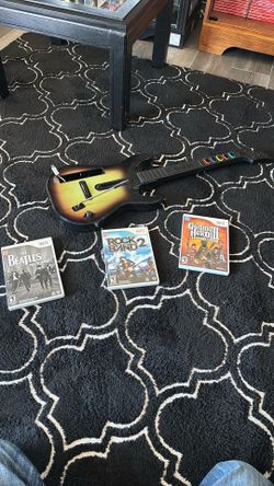 Wii Rock Band games and guitar