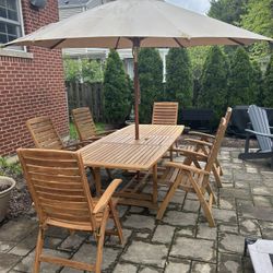 Solid teak Table and chairs