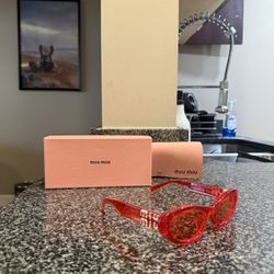Miu miu Glasses