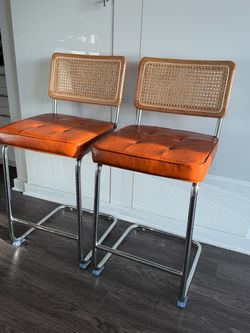 Two rattan stools