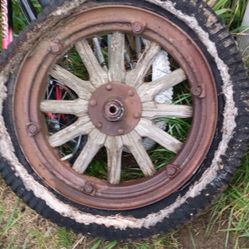 15" vintage antique wagon wheel or model t tire with wooden spokes and iron over 100 years old