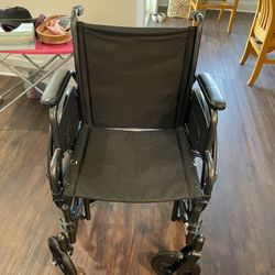 Wheelchair And Wheelchair Cover