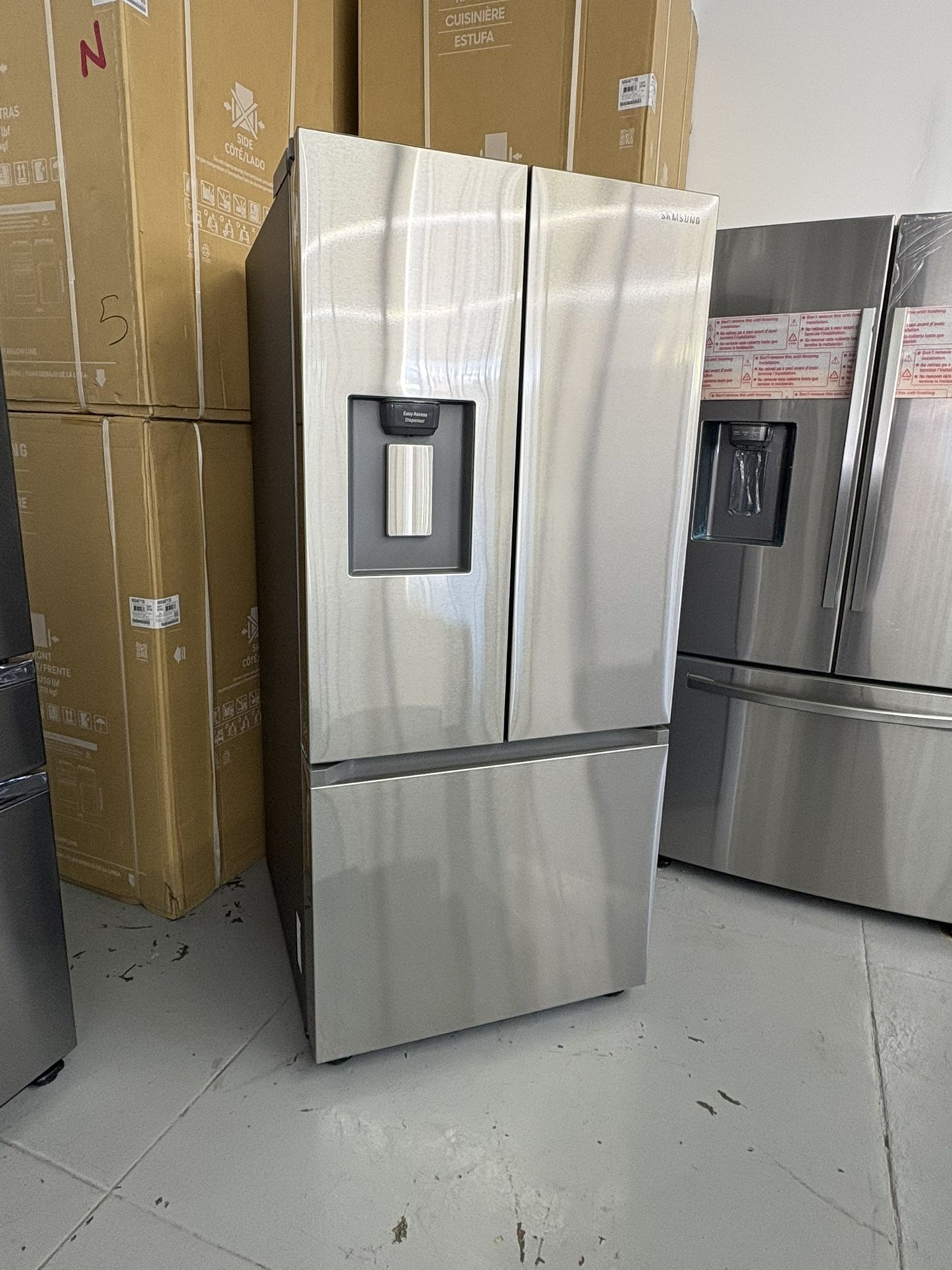 Samsung 30” 22 cu. ft. Standard Depth 3-Door French Door Smart Refrigerator in Fingerprint Resistant Stainless Steel with Dispenser