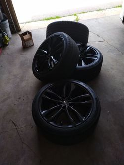 19 inch Chevy sport rims with tires just 2 yrs. old.