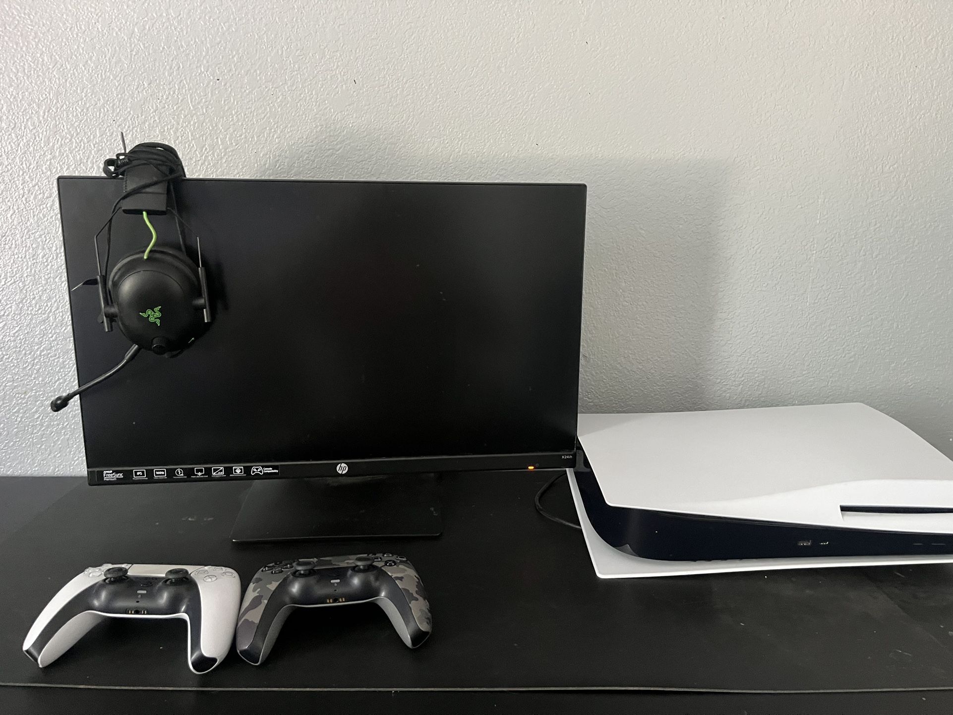 PS5 with 2 PS5 controllers. Razor headset, and HP monitor 144hz.