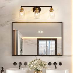 3-Light Vanity Fixture – $499 new, asking $300
• Black/brass finish with clear glass shades
• Wet location rated (bathroom safe)
• Stylish for master 