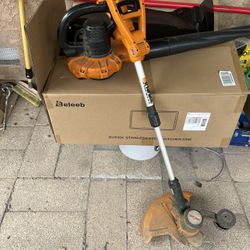 Trimmer/ Blower Land Scape
