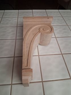 One (x1) WOOD CORBEL by Ekena Millwork (COR05X08X16SCMA). Measures 5 1/2"W x 8 1/4"D x 16"H, Alder....asking $60.00