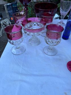 King’s Crown (Thumbprint) pattern with a cranberry/ruby flashed upper rim