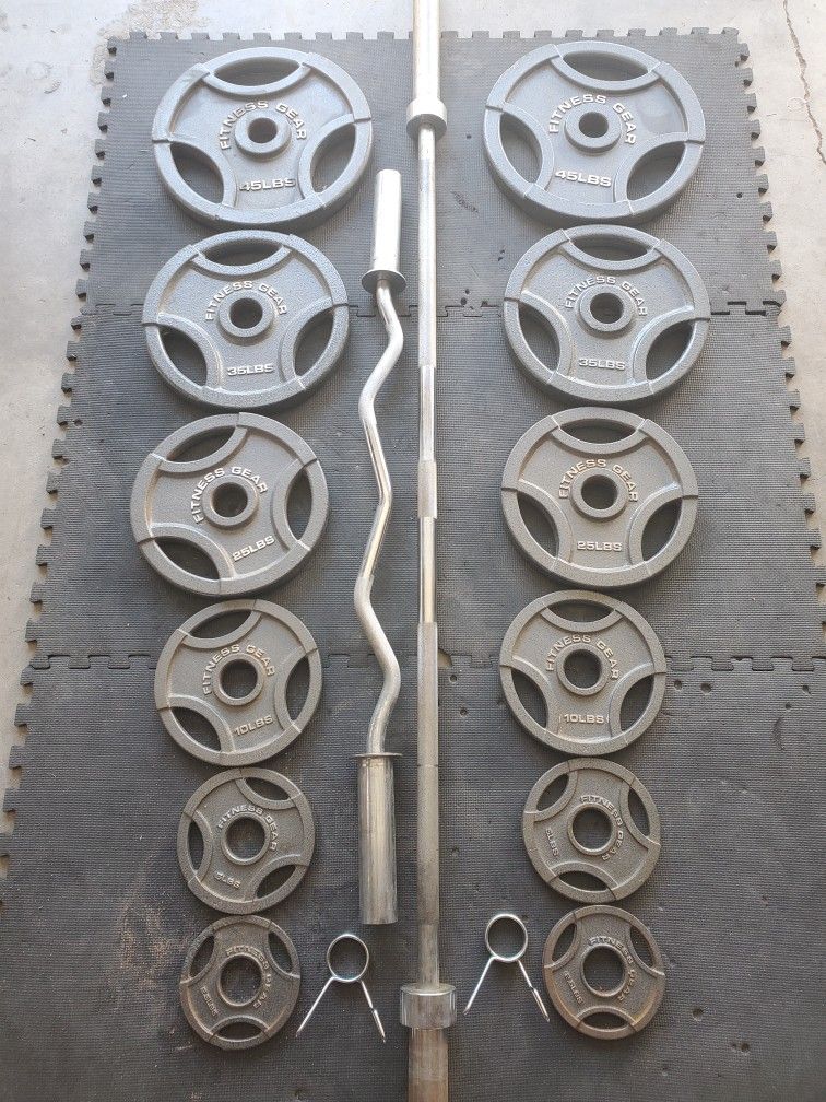 Complete Olympic Weight Set With Olympic Bar & Curl bar ..295lbs all together read Description below