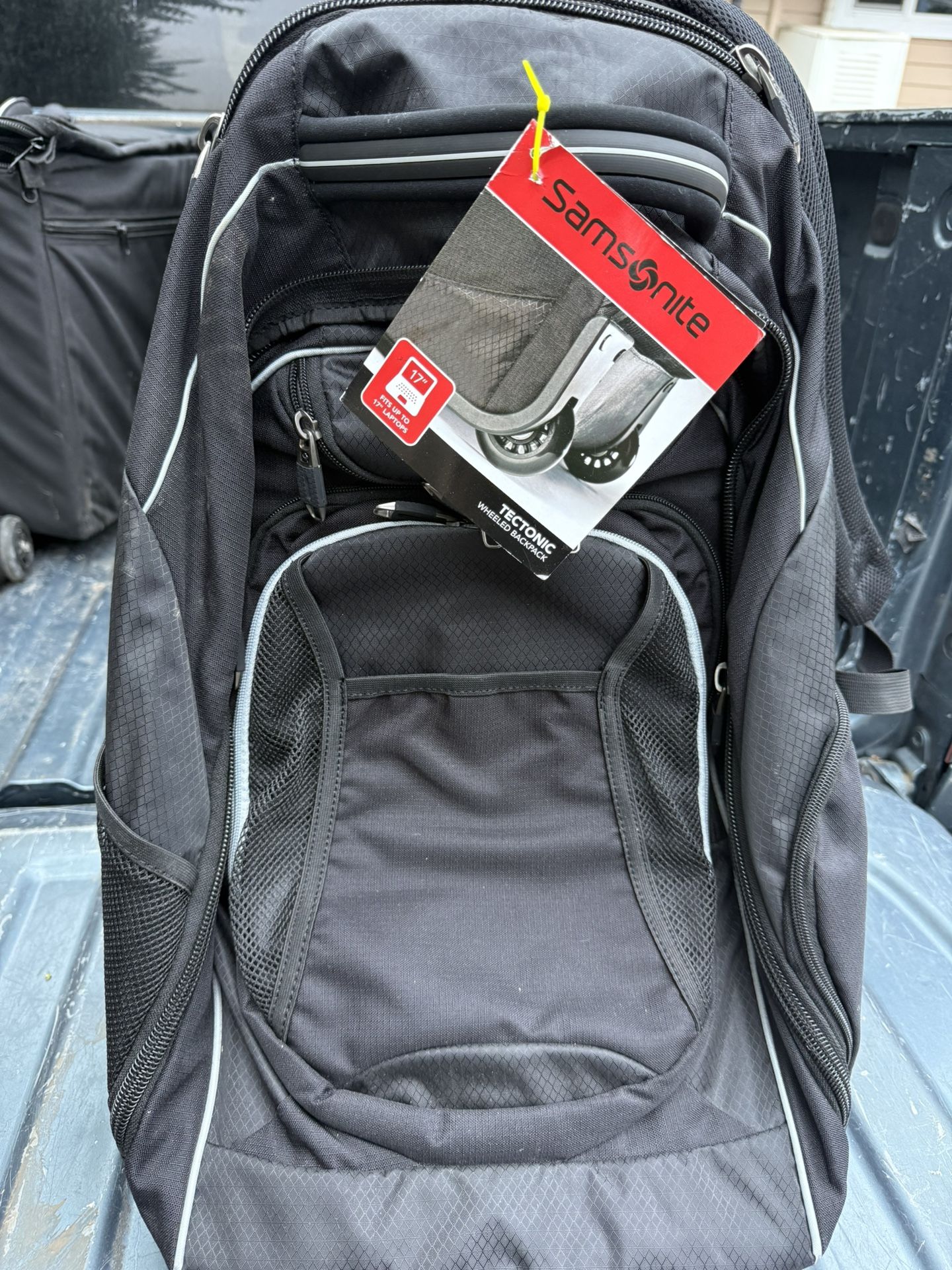 Samsonite Rolling backpack