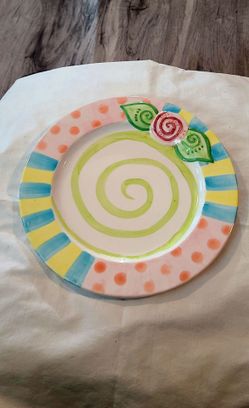 Lg. Colorful Ceramic Plate by Shannon McGraw for GANZ. This plate has a hand-painted style design featuring a green spiral center and a raised pink ro