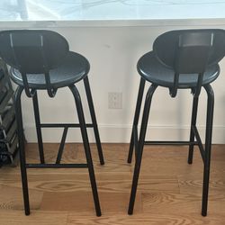 TWO BLACK BAR STOOLS COUNTERTOP STOOLS METAL AND PLASTIC 