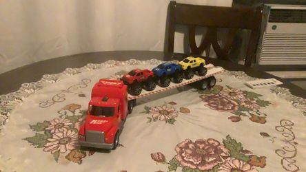 Truck toy, carrying three little trucks