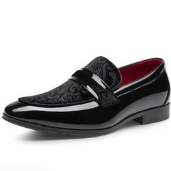 Black leather loafers with red interior. 