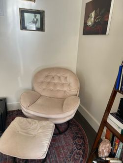 Armchair with footrest