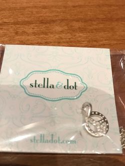 Stella & Dot silver necklace and peace charm
