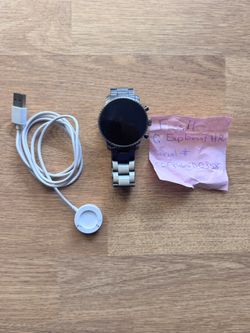 Fossil Q Explorist HR Smartwatch includes charging cable