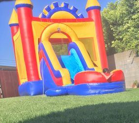 For sale- bounce house with water slide and pool attachment