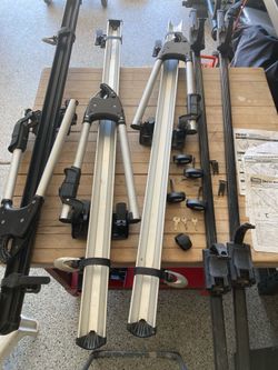 Three Thule Big Mouth Bike Carriers and Roof Cross Bars