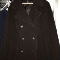 Woman’s chocolate brown warm peacoat